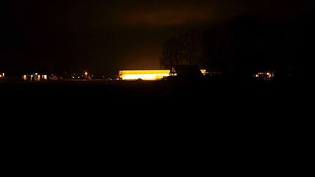 De gloed van de verlichting in een kas